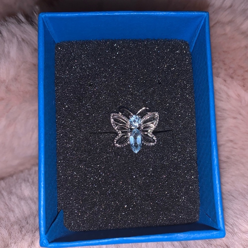Sky Blue Topaz Rhodium Over Sterling Silver Butterfly Ring 0.87ctw